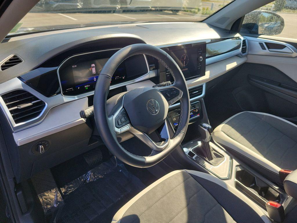 used 2025 Volkswagen Taos car, priced at $23,495