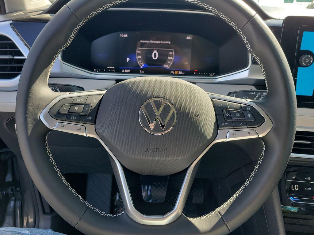 new 2025 Volkswagen Taos car, priced at $27,027