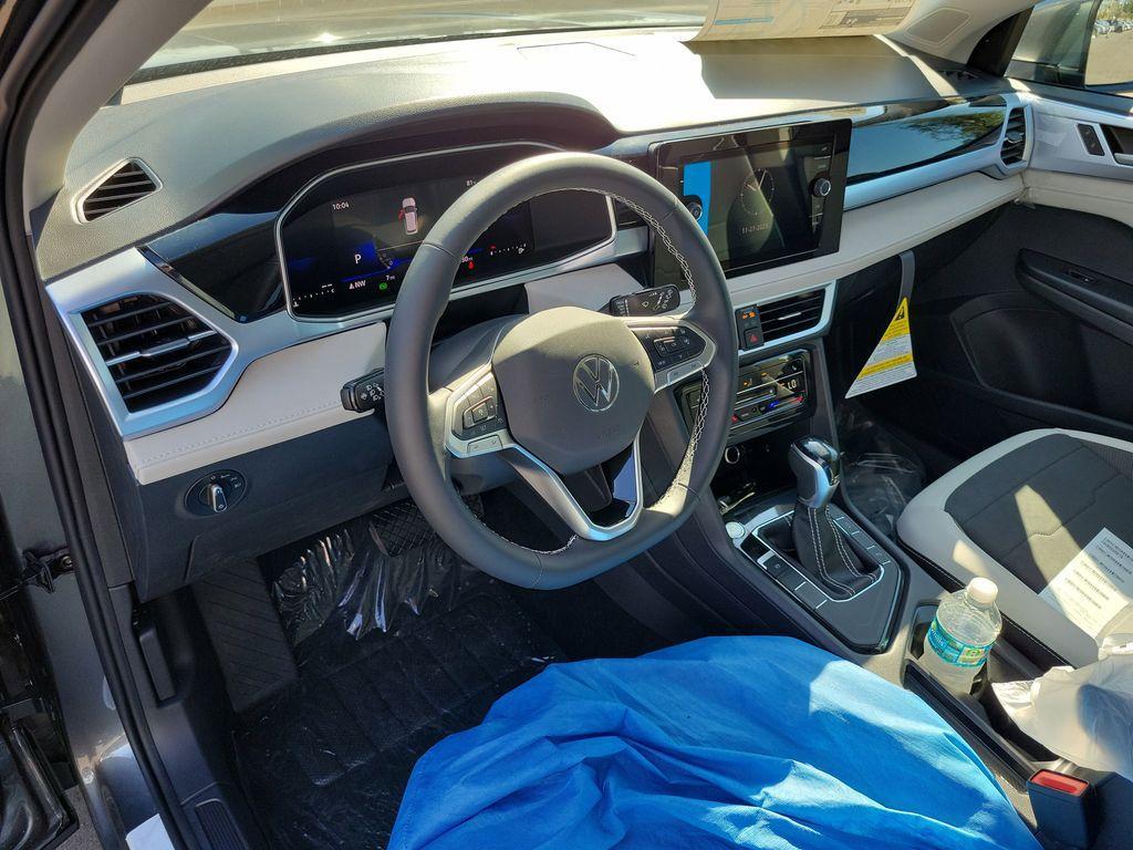 new 2025 Volkswagen Taos car, priced at $27,027