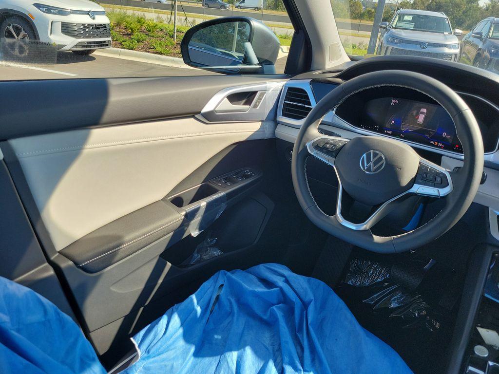 new 2025 Volkswagen Taos car, priced at $27,027