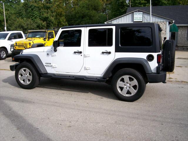 used 2013 Jeep Wrangler Unlimited car, priced at $15,999