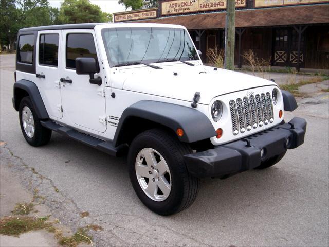 used 2013 Jeep Wrangler Unlimited car, priced at $15,999