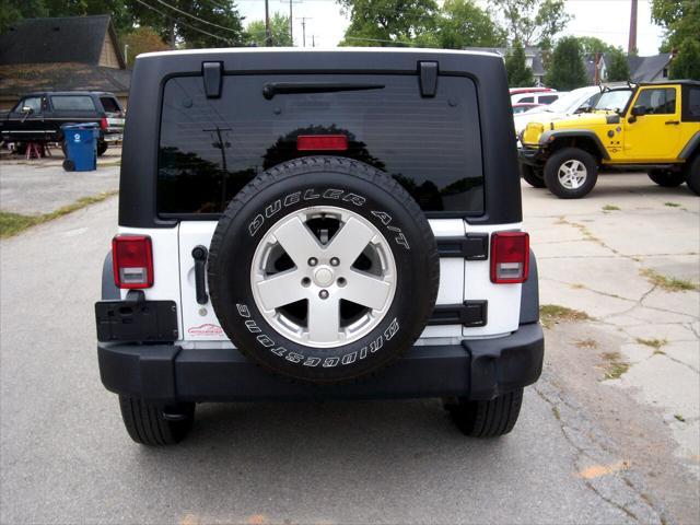 used 2013 Jeep Wrangler Unlimited car, priced at $15,999