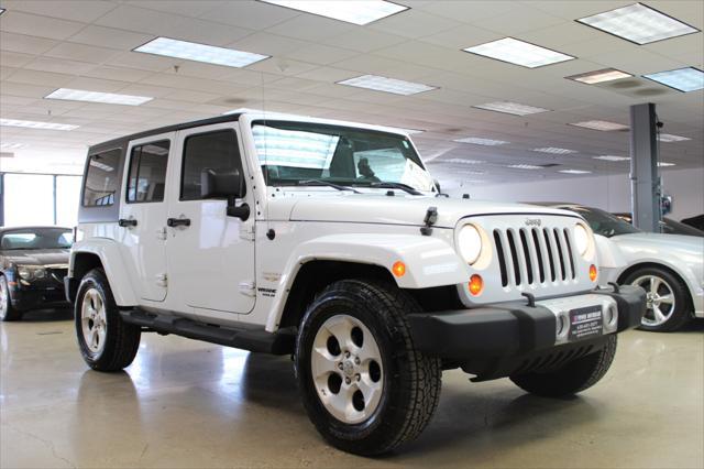 used 2013 Jeep Wrangler Unlimited car, priced at $17,800