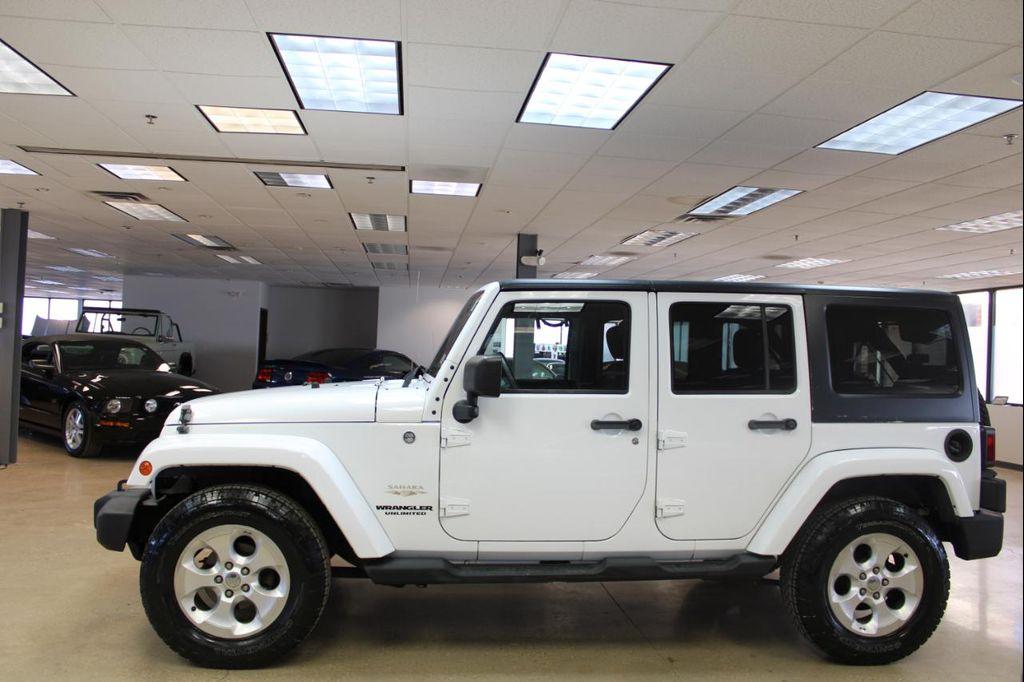 used 2013 Jeep Wrangler Unlimited car, priced at $16,999