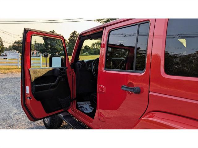 used 2014 Jeep Wrangler Unlimited car, priced at $15,399