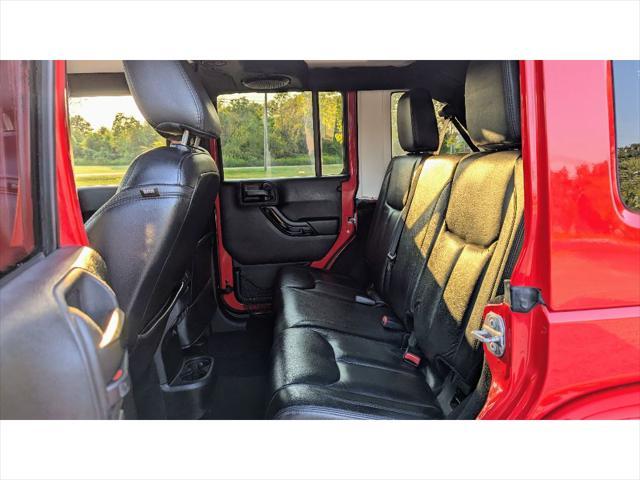 used 2014 Jeep Wrangler Unlimited car, priced at $15,399