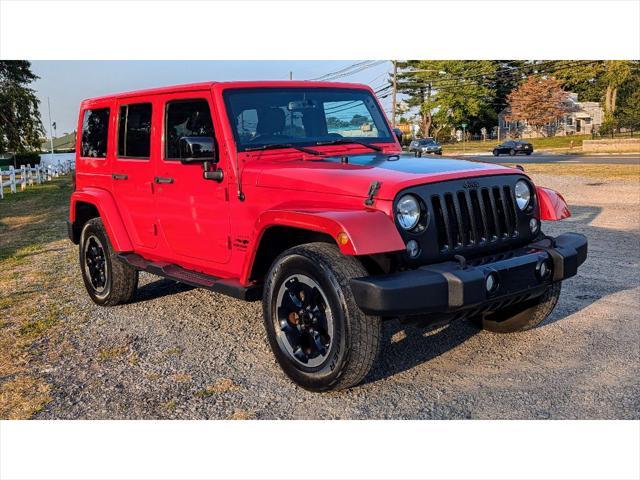 used 2014 Jeep Wrangler Unlimited car, priced at $15,399