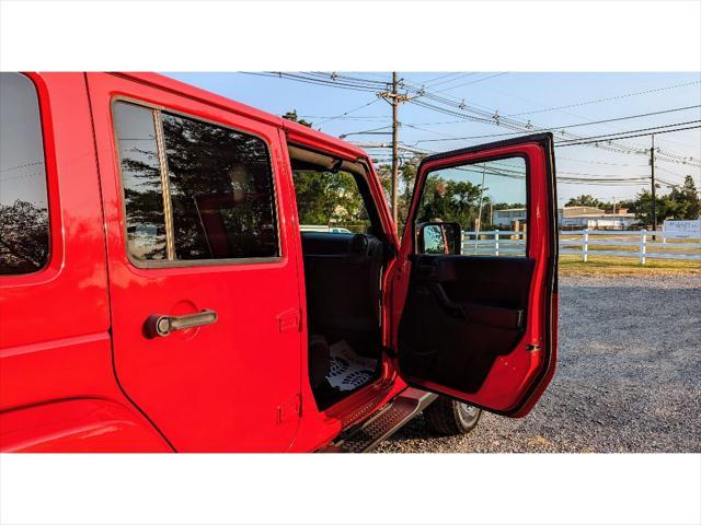 used 2014 Jeep Wrangler Unlimited car, priced at $15,399