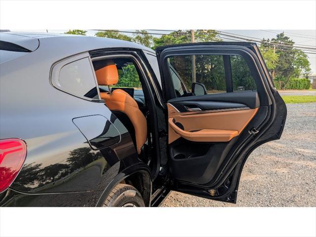 used 2022 BMW X4 car, priced at $37,499