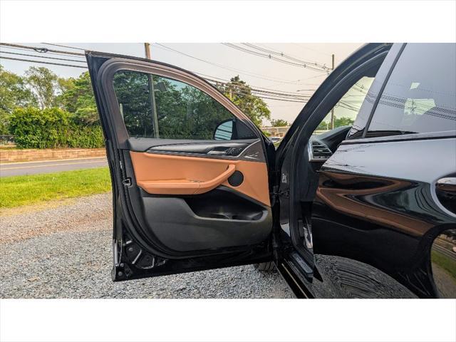 used 2022 BMW X4 car, priced at $37,499