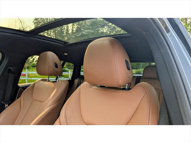 used 2022 BMW X4 car, priced at $37,499