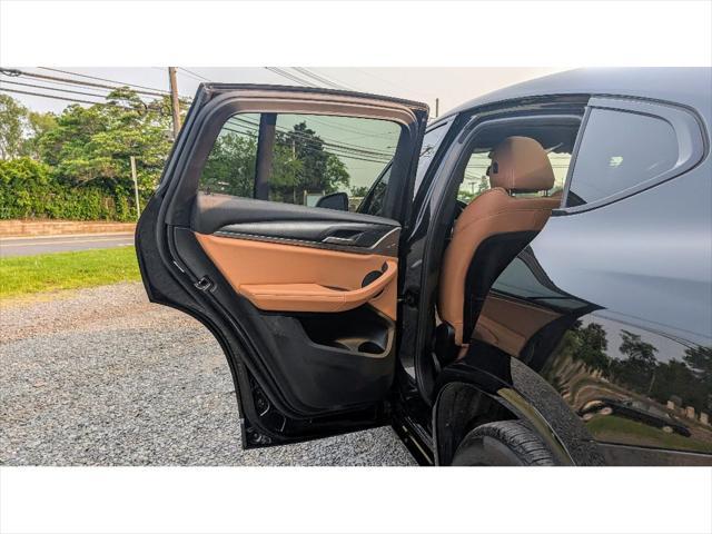 used 2022 BMW X4 car, priced at $37,499