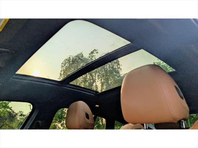 used 2022 BMW X4 car, priced at $37,499