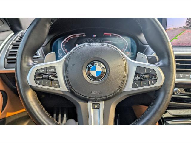 used 2022 BMW X4 car, priced at $37,499