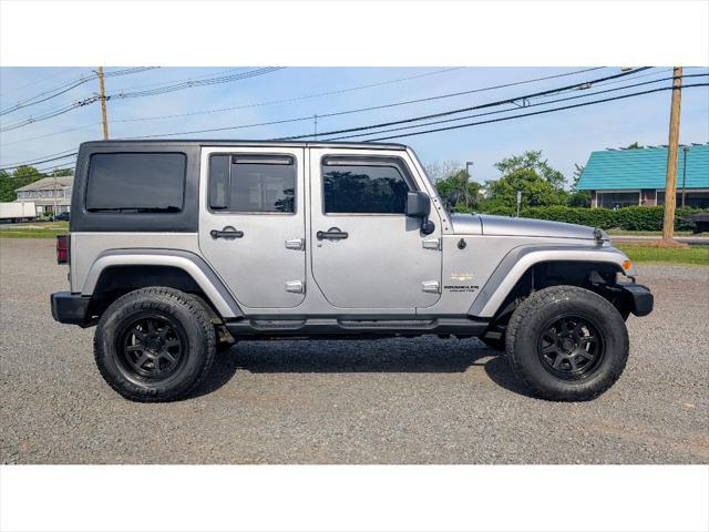used 2013 Jeep Wrangler Unlimited car, priced at $14,900