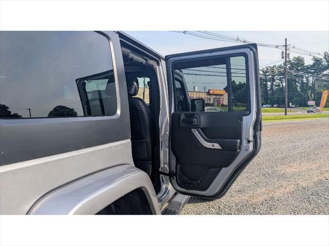 used 2013 Jeep Wrangler Unlimited car, priced at $14,900