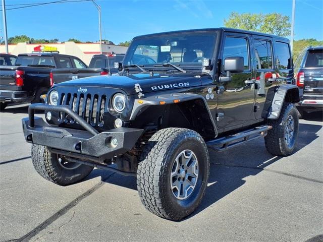 used 2014 Jeep Wrangler Unlimited car, priced at $13,234