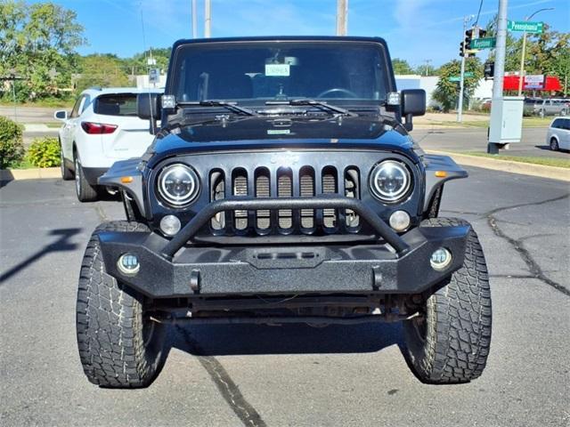 used 2014 Jeep Wrangler Unlimited car, priced at $13,234