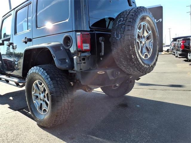 used 2014 Jeep Wrangler Unlimited car, priced at $13,234
