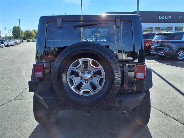 used 2014 Jeep Wrangler Unlimited car, priced at $13,234