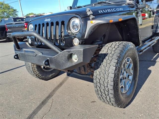 used 2014 Jeep Wrangler Unlimited car, priced at $13,234