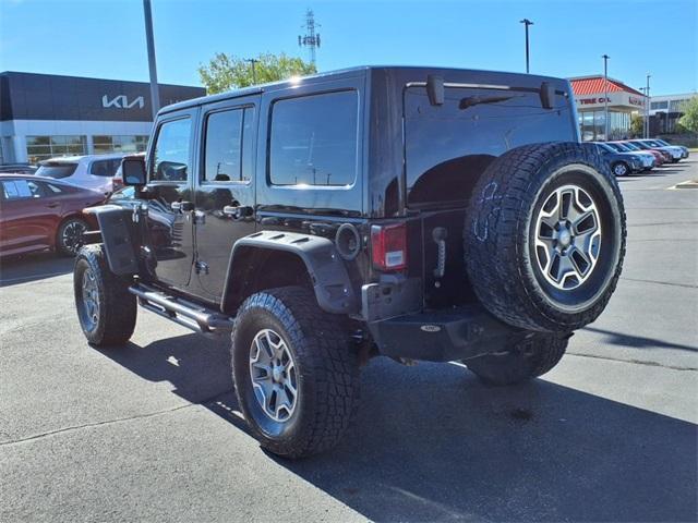 used 2014 Jeep Wrangler Unlimited car, priced at $13,234