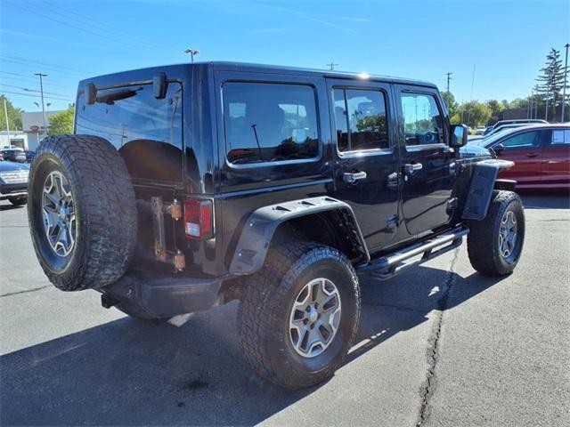 used 2014 Jeep Wrangler Unlimited car, priced at $13,234