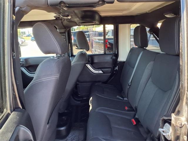 used 2014 Jeep Wrangler Unlimited car, priced at $13,234