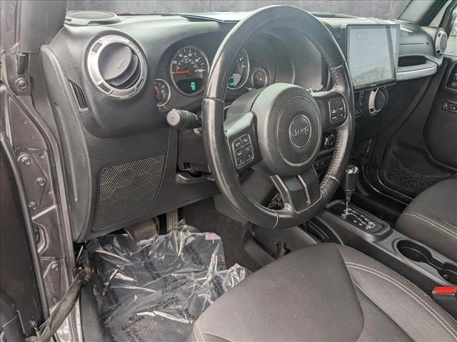 used 2016 Jeep Wrangler Unlimited car, priced at $20,561