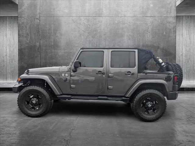 used 2016 Jeep Wrangler Unlimited car, priced at $20,561