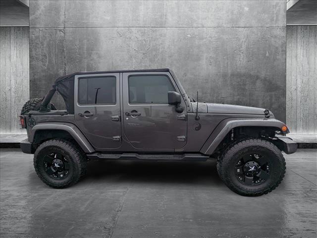 used 2016 Jeep Wrangler Unlimited car, priced at $20,561