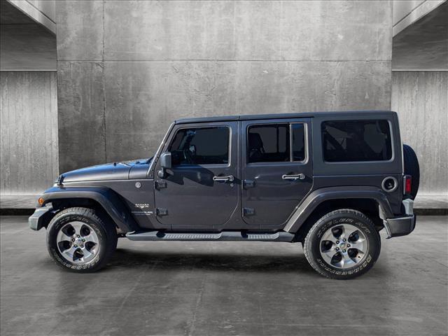 used 2017 Jeep Wrangler Unlimited car, priced at $24,266