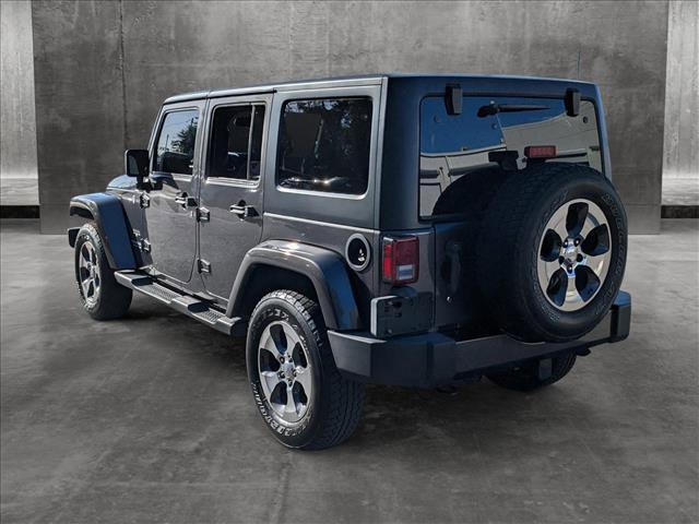 used 2017 Jeep Wrangler Unlimited car, priced at $24,266