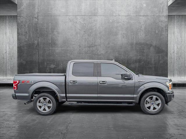 used 2018 Ford F-150 car, priced at $26,587