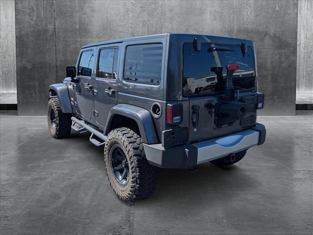 used 2014 Jeep Wrangler Unlimited car, priced at $17,225