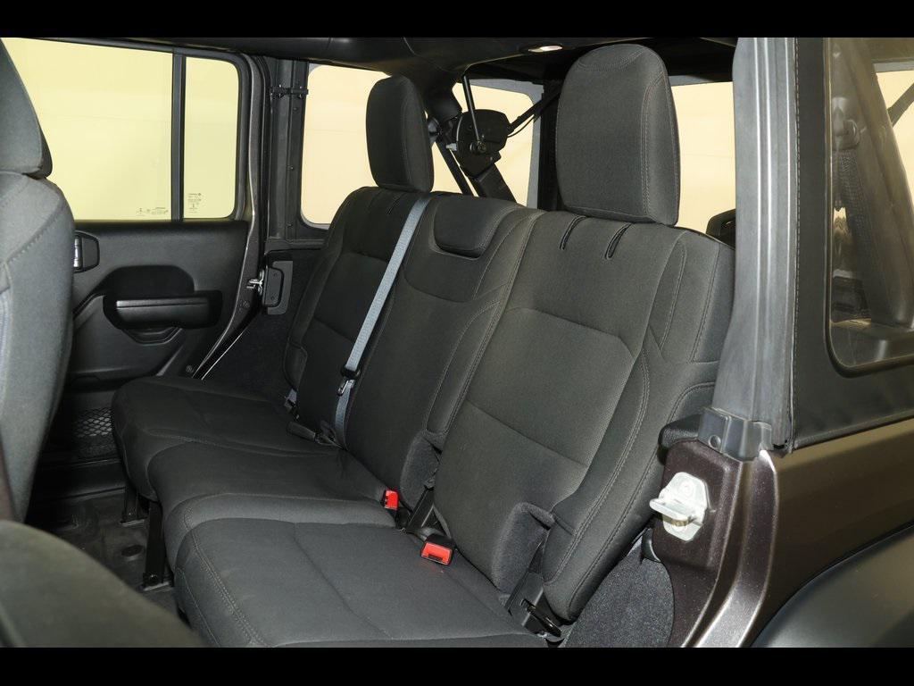 used 2021 Jeep Wrangler Unlimited car, priced at $24,497