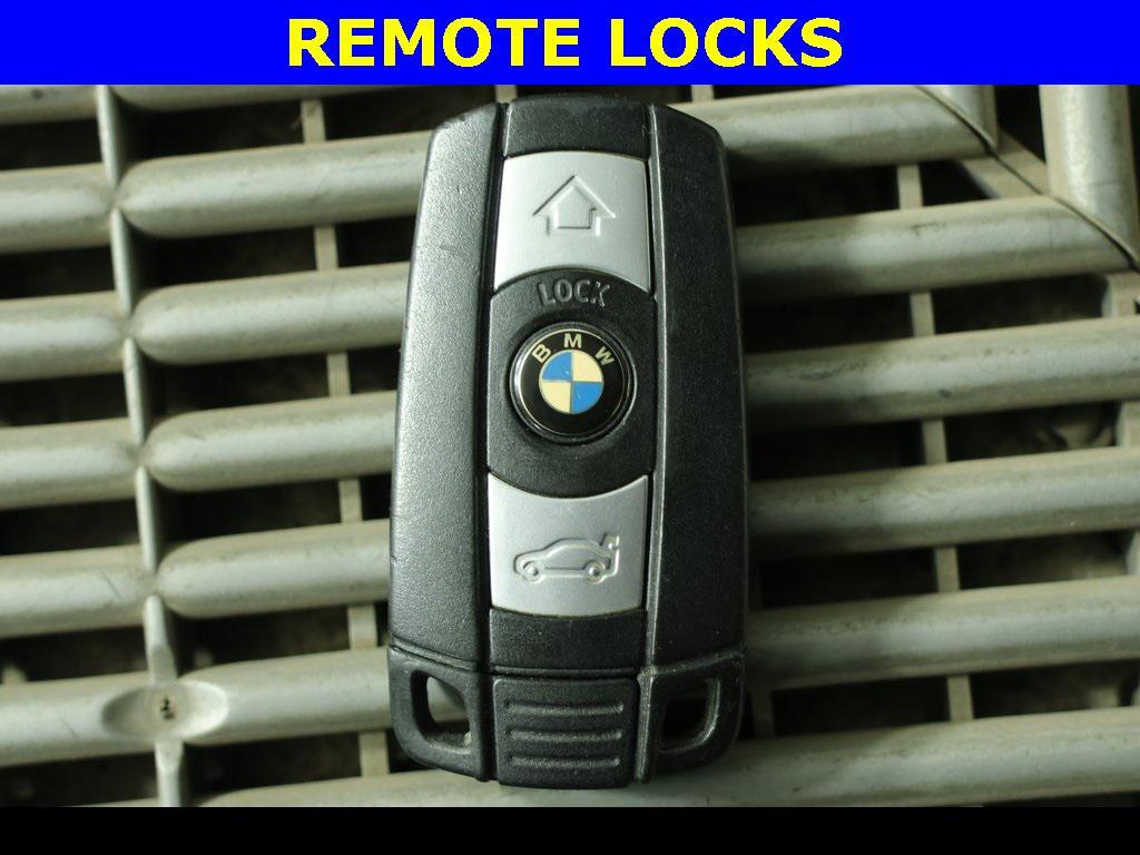 used 2013 BMW 128 car, priced at $9,879