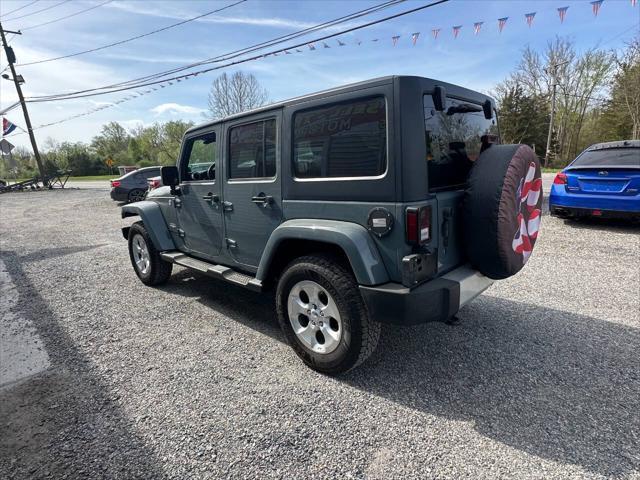 used 2014 Jeep Wrangler Unlimited car, priced at $14,799