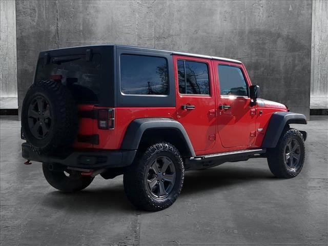 used 2018 Jeep Wrangler JK Unlimited car, priced at $27,491