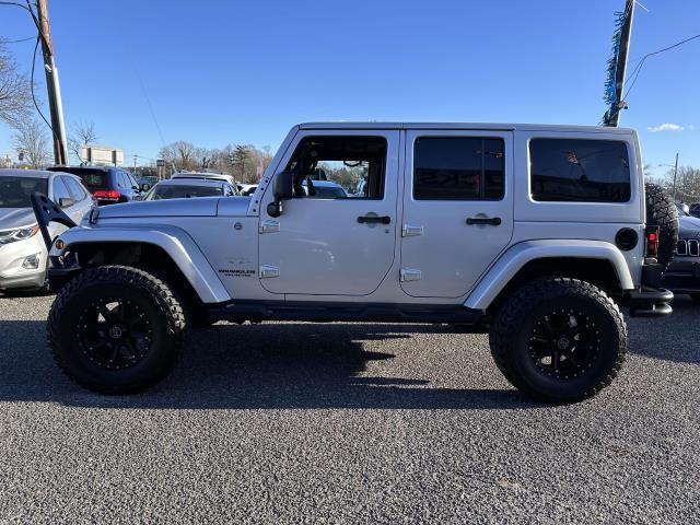 used 2012 Jeep Wrangler Unlimited car, priced at $17,995