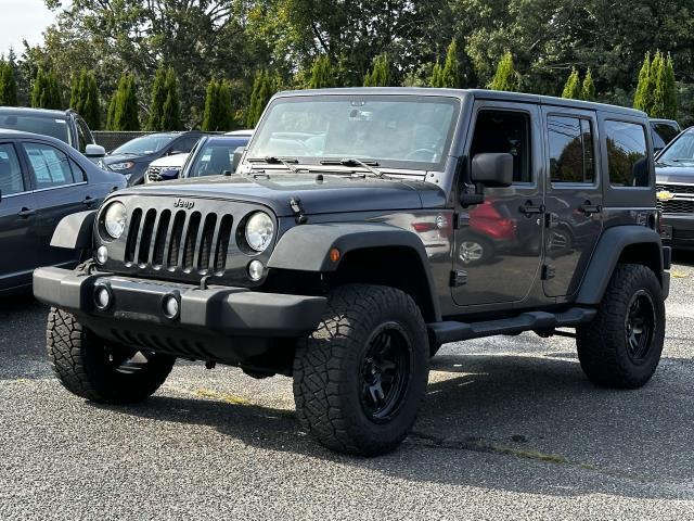 used 2014 Jeep Wrangler Unlimited car, priced at $22,995