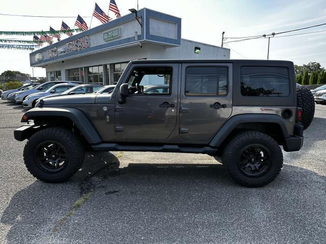 used 2014 Jeep Wrangler Unlimited car, priced at $22,995