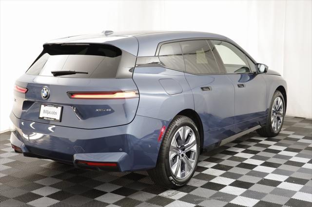 new 2026 BMW iX car, priced at $77,885