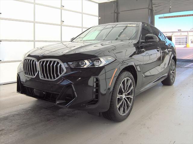 used 2024 BMW X6 car, priced at $75,877