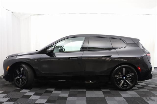 new 2024 BMW iX car, priced at $98,320