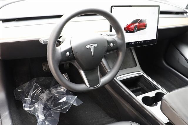 used 2022 Tesla Model 3 car, priced at $27,877