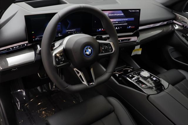 new 2026 BMW 550e car, priced at $87,675