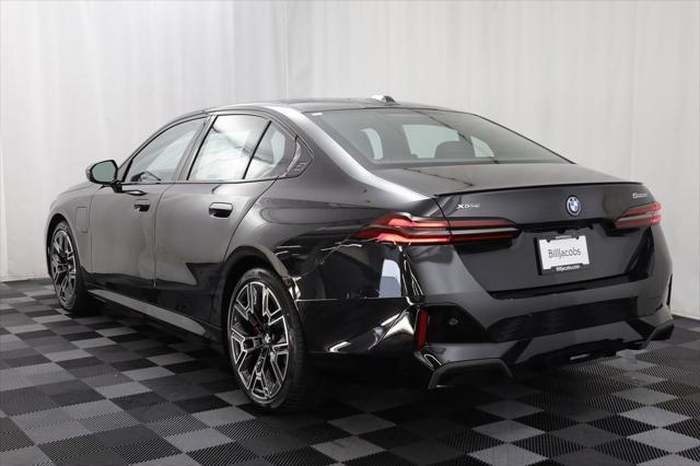 new 2026 BMW 550e car, priced at $87,675