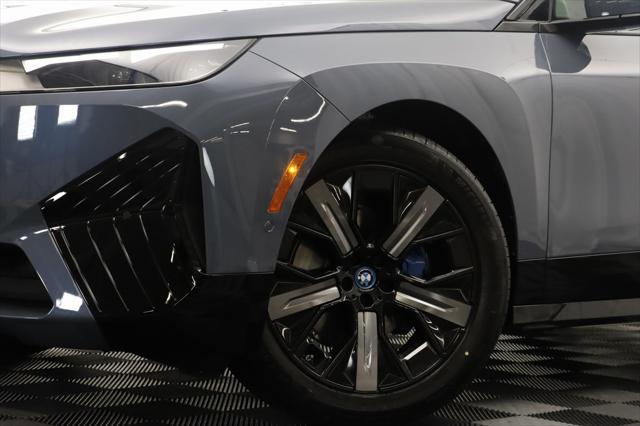 new 2024 BMW iX car, priced at $102,570